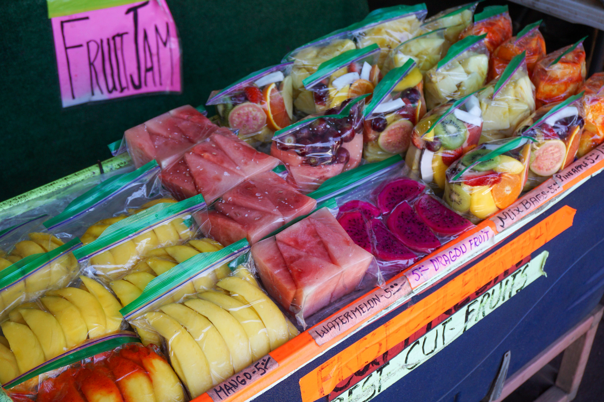 dragon fruit, watermelon, pineapple - Fresh tropical fruit stand | Kahuku Land Farm, North Shore, Oahu, Hawaii