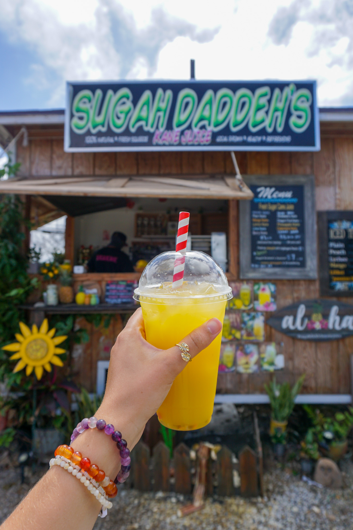 Sugar Daddeh's Cane Juice with lilikoi in Kahuku - Oahu North Shore Food Trucks