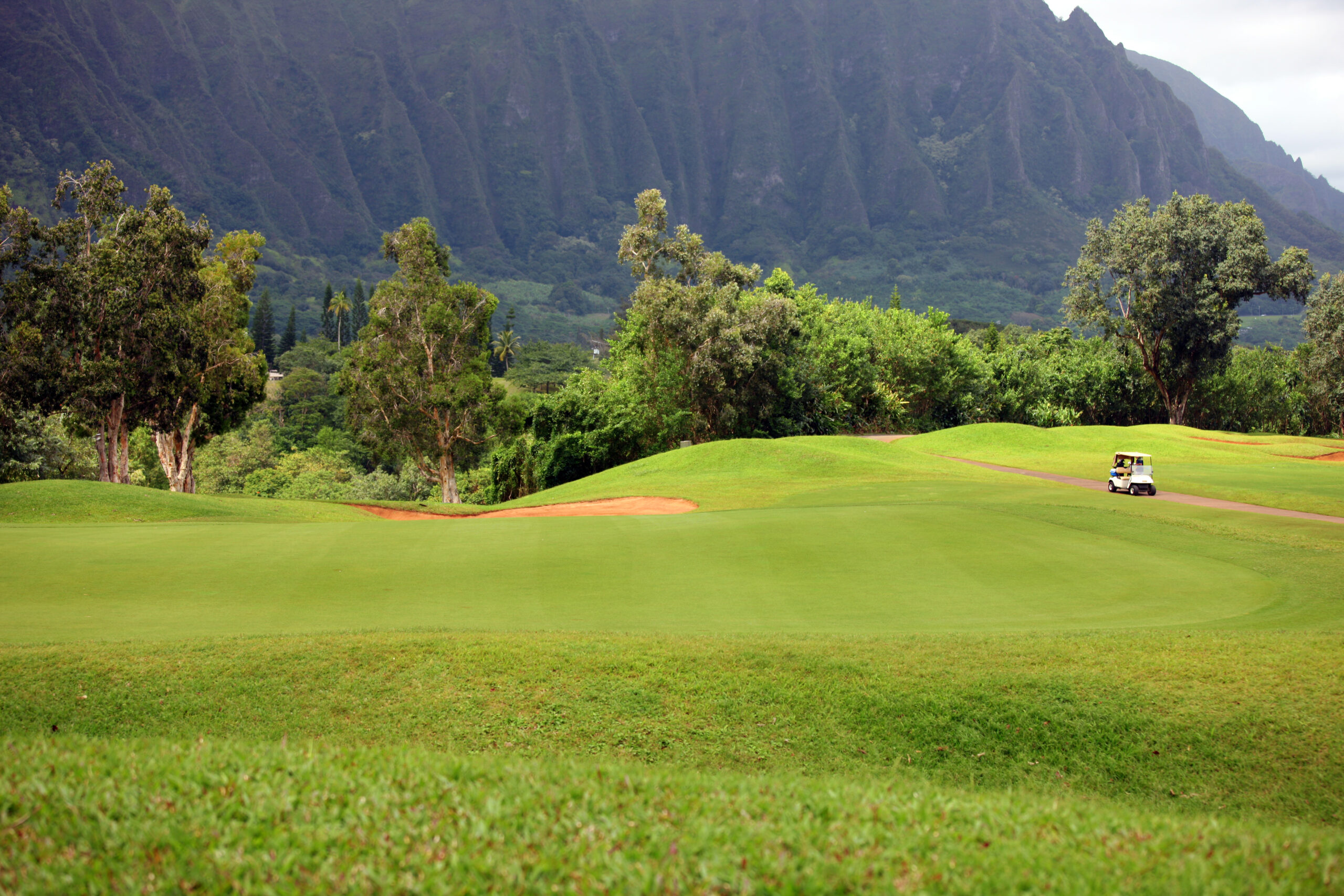 Golf cart on golf course at Ko'olau Golf Club on Oahu Hawaii