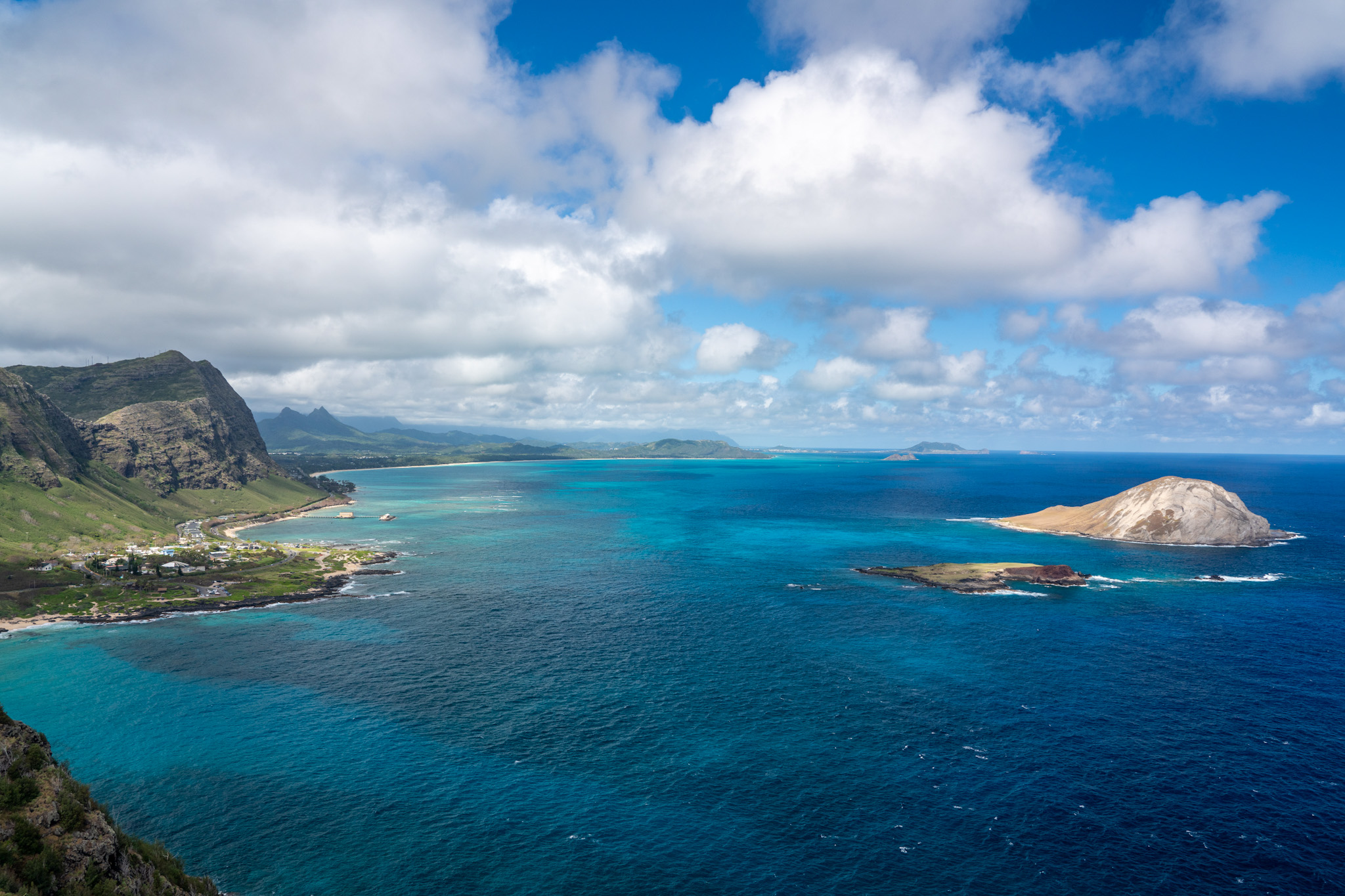 Panorama across the East coastline of Oahu over Makapu'u beach with Rabbit and Kaohikaipu islands from lighthouse
